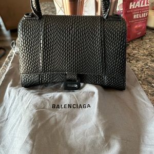 Selling my balenciaga purse retails for $3000 selling for $2500.